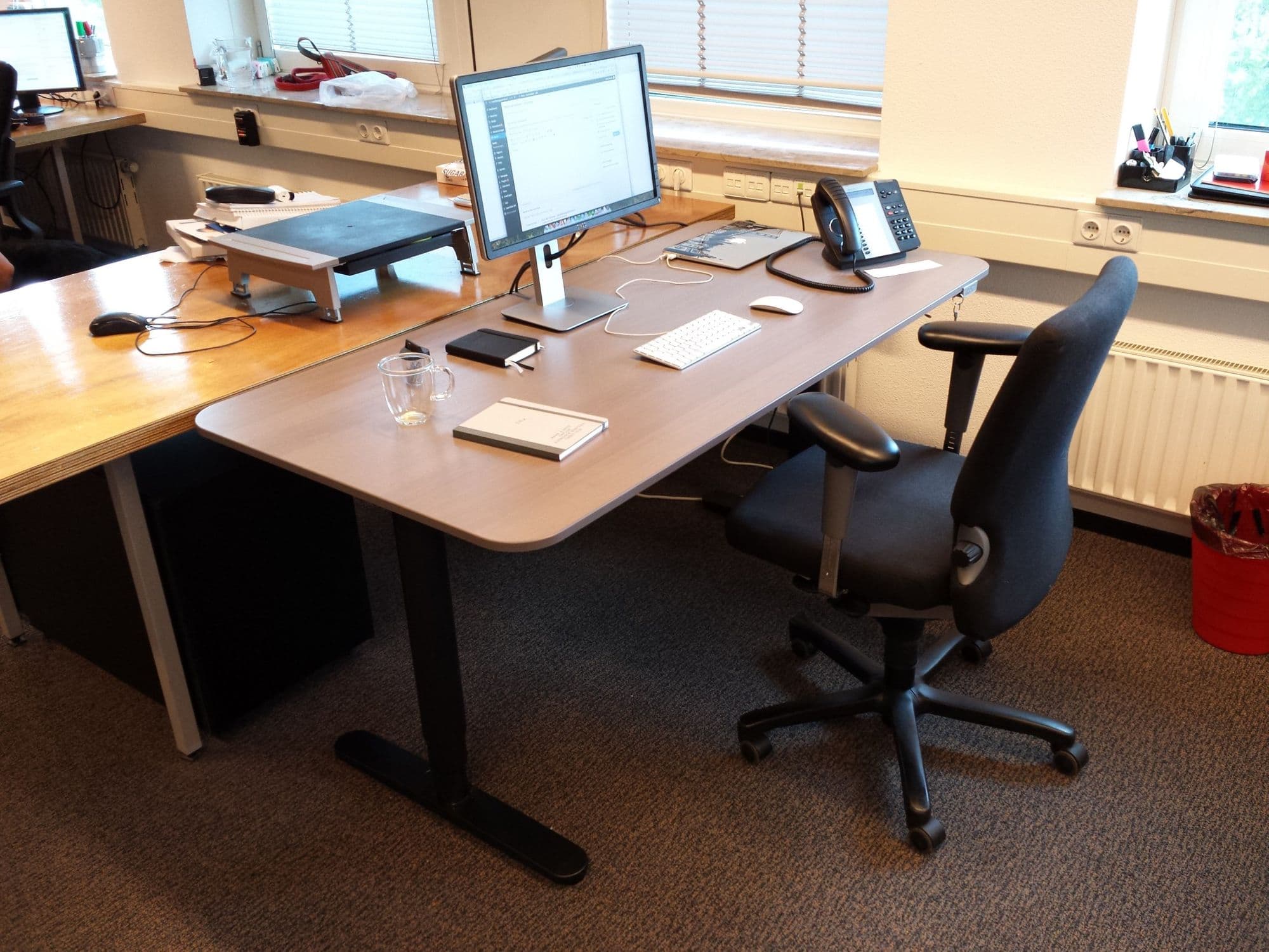 Working behind a standing desk